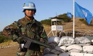 Bolivian Army 2nd Lt. Mauricio Vidangos stands guard at the entry control point of an Observation Point